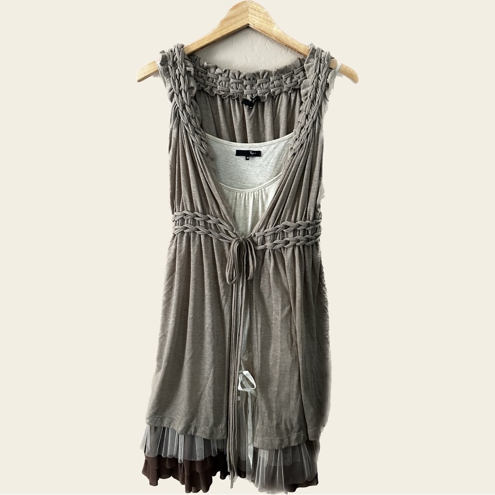 Sleeveless mini dress with tulle base and vest cover up.